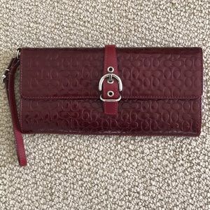 Coach red patent leather clutch